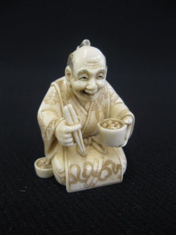 Carved Ivory Netsuke of a Kneeling 14c0d7