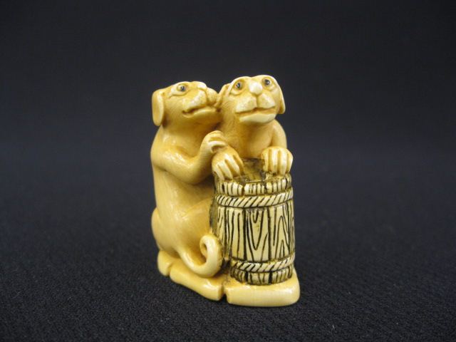 Carved Ivory Netsuke of Two Dogs