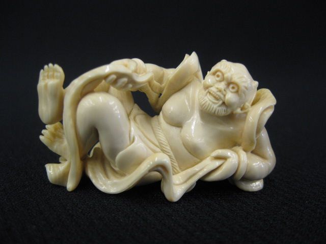 Carved Ivory Netsuke of a Reclining 14c108