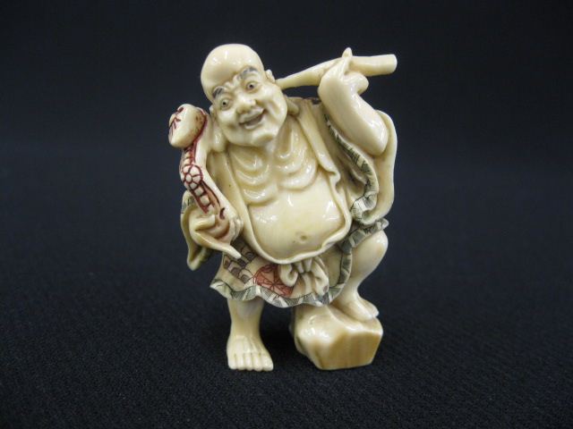 Carved Ivory Netsuke of Lohan cleaning 14c10b