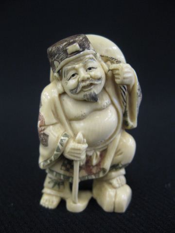 Carved Ivory Netsuke of The god 14c10c