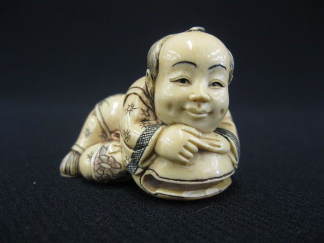 Carved Ivory Netsuke of a Child