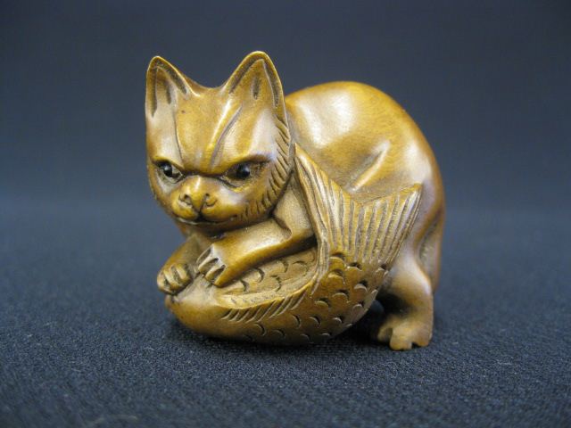 Carved Boxwood Netsuke of a Cat