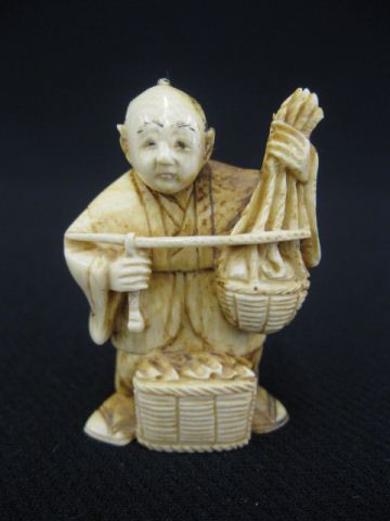 Carved Ivory Netsuke of a Farmer with