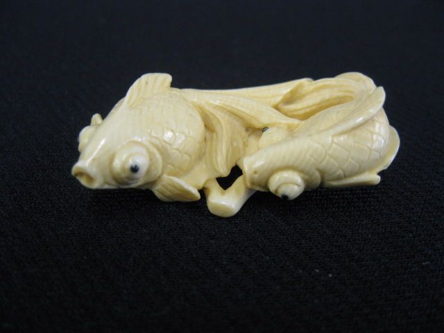 Carved Ivory Netsuke of Two Gold