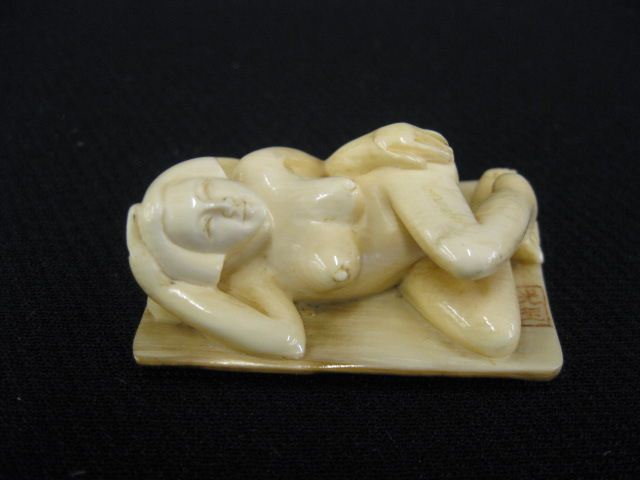 Carved Ivory Netsuke of a Reclining