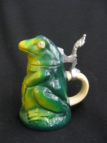 German Pottery Figural Stein seated