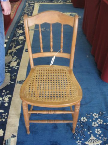 Maple Side Chair cane seat spindle back.
