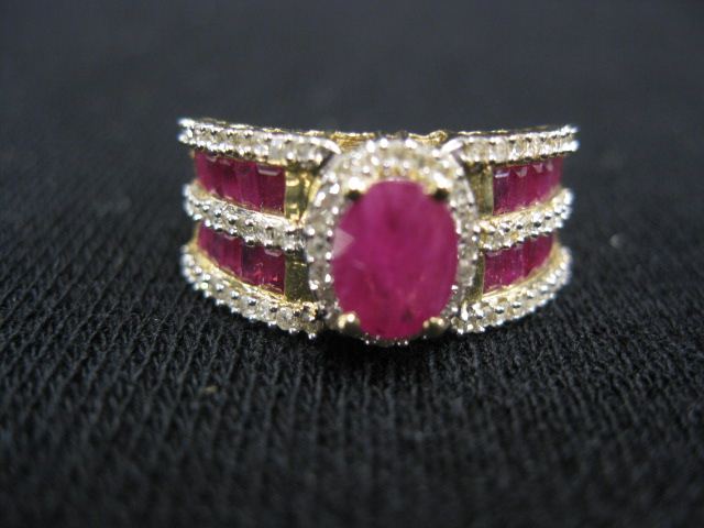 Ruby & Diamond Ring oval ruby surroundedby