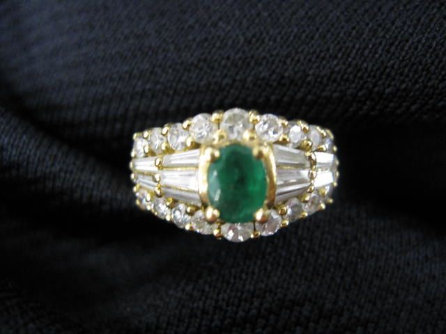 Emerald & Diamond Ring .34 carat oval