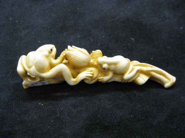 Carved Ivory Netsuke of Frogs on