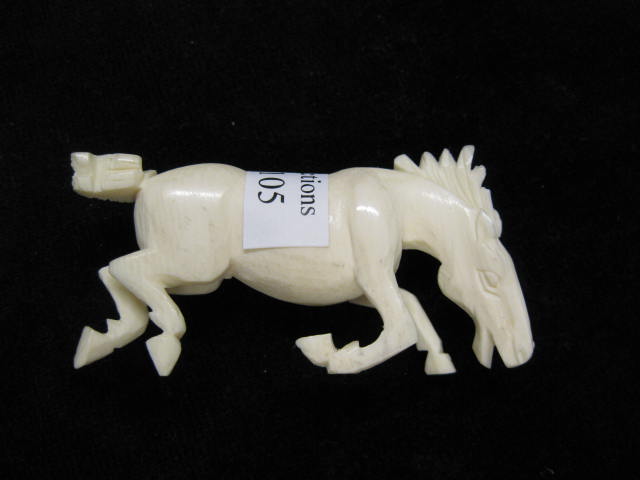 Carved Ivory Figurine of a Running Horse