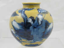 A Chinese vase with blue figures on