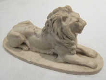 A Russian figure of a lion inset