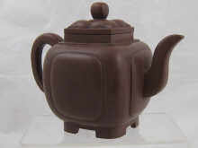 A Chinese Yixing teapot of rounded cube