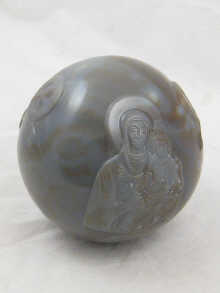A large chalcedony sphere with Christian