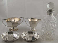 A pair of lobed silver dishes London