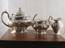 A three piece silver teaset in original