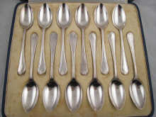 A boxed set of 12 silver grapefruit