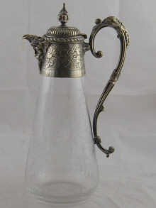 A glass claret jug with silver 14f7b2