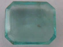 A loose polished emerald approx.