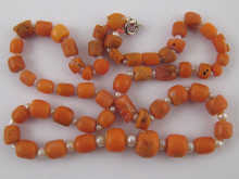 A coral and pearl necklace approx. 40