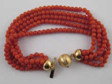 A five strand coral bead bracelet