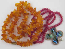 A mixed lot comprising a ruby bead