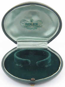 A vintage Rolex watch box.