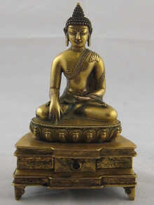 A gilt bronze Tibetan figure of