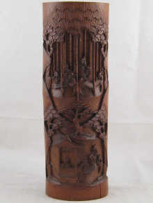 A Chinese bamboo brushpot deeply carved