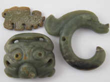 Three jade or hardstone pendants