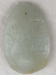 A Chinese jade ovate pendant carved 14f87b