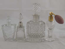 Three glass scent bottles one by