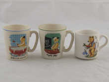 Three ceramic childs mugs two featuring