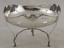 A pierced silver bowl on three 14f89f