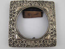 A silver photo frame with pierced 14f8ce