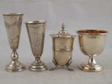 Silver. Two kiddush cups an egg cup