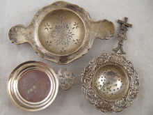 A mixed lot comprising two tea strainers