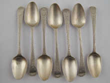 A set of six plus one bright cut silver
