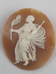 A carved shell cameo of a classical
