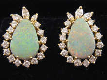 A pair of 18 carat gold pear shaped