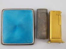 A Dunhill table lighter and a silver 14f954