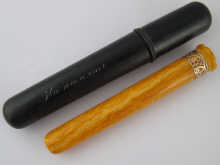 A Russian gold mounted amber cheroot 14f94c