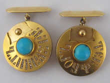 A pair of Russian yellow metal