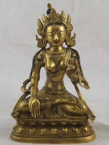 A gilded bronze Tibetan deity with