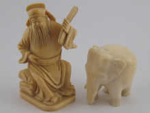 An ivory figure of a Chinese scholar