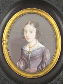 A 19 th century oval portrait miniature