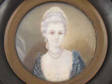 A 19th century circular portrait miniature