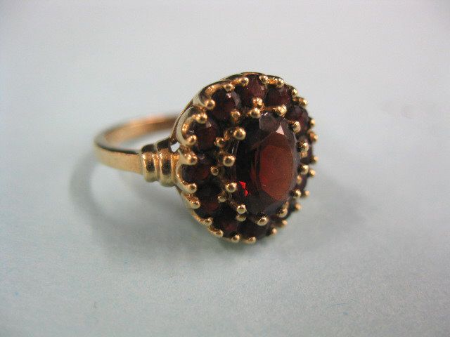 Garnet Ring oval gem surrounded 14fc1b